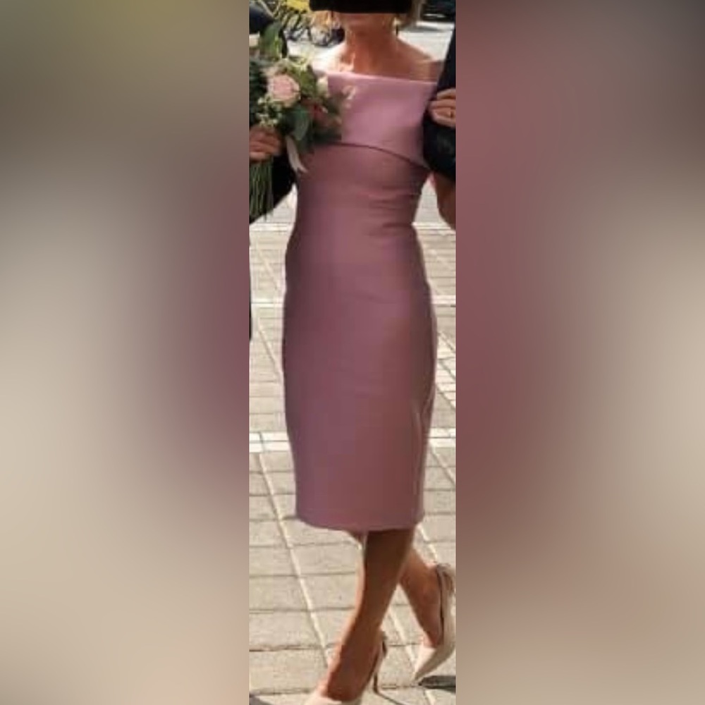Bought the dress at fashion district in Los Angeles is size medium and pink